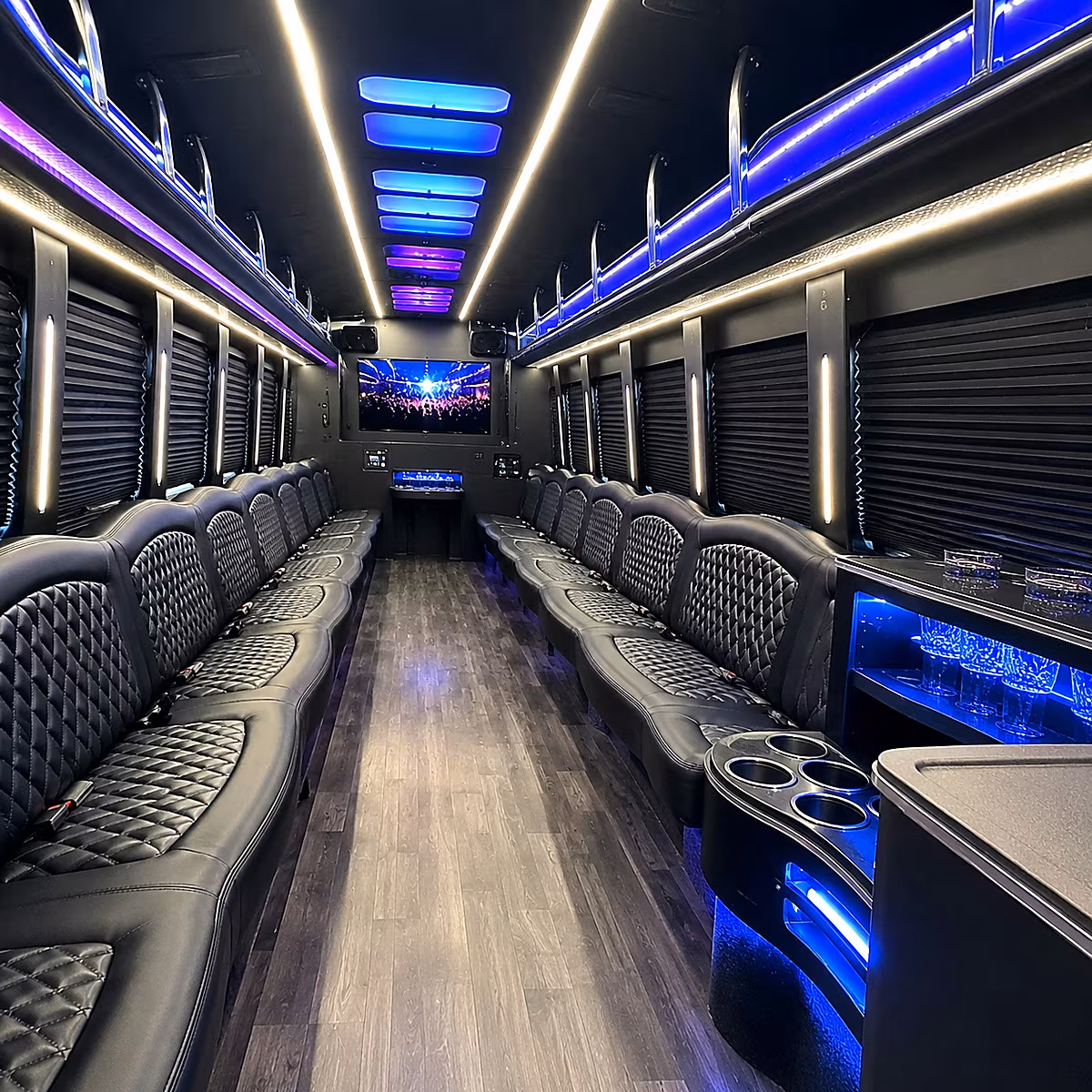 Wedding guests seated inside a party bus serving Birmingham